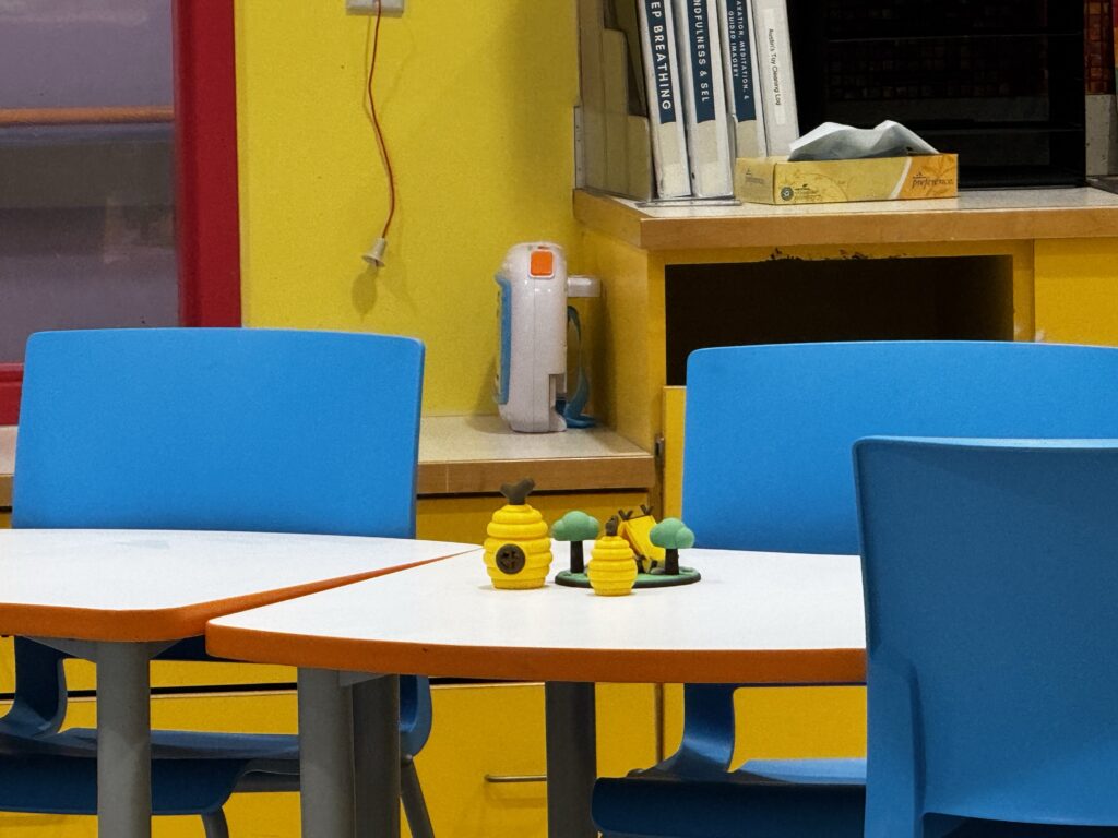 Handmade bee creations on a table during Brooklyn’s hospital stay.